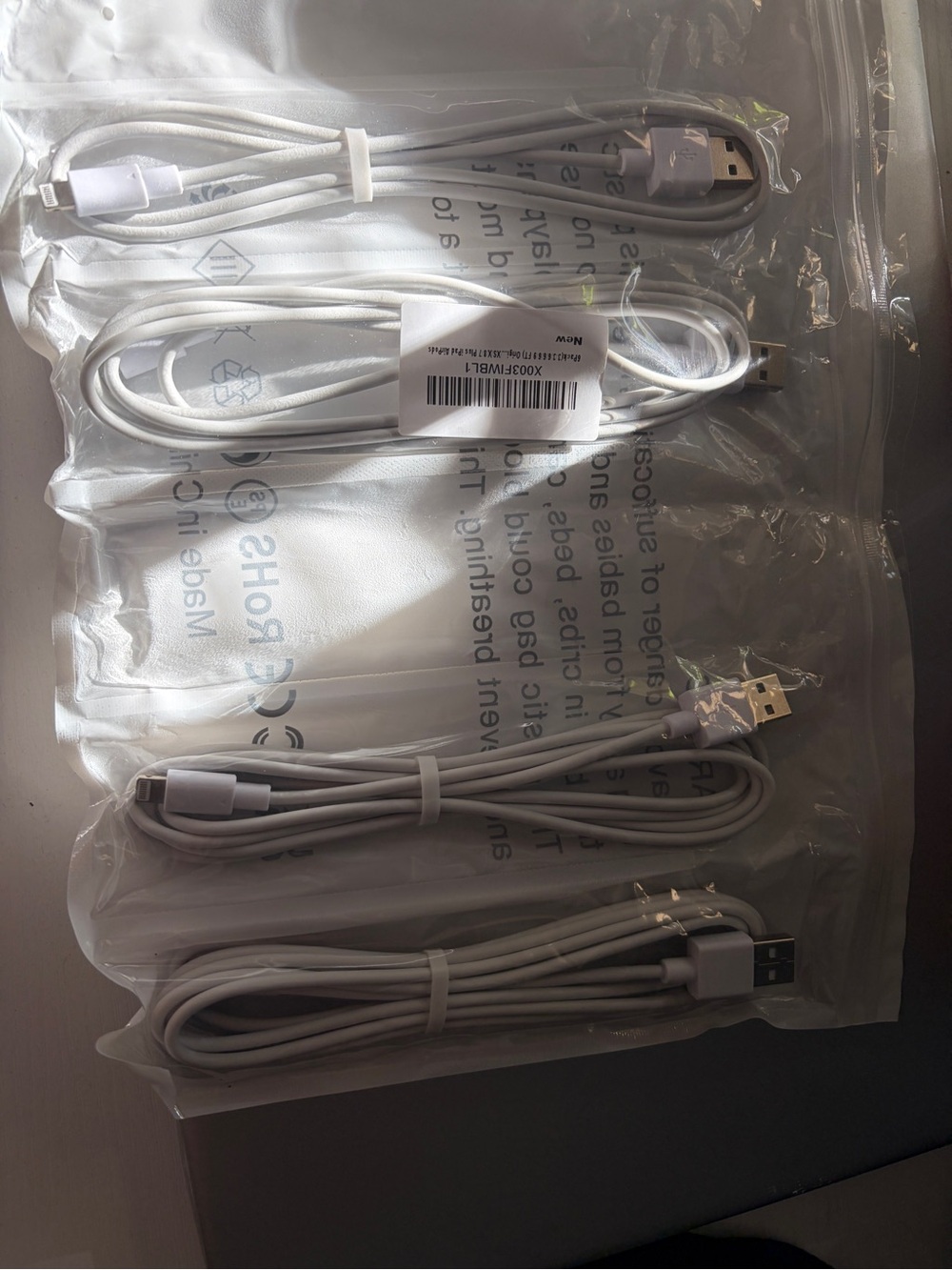 Universal White USB Cable - 4 Pack and 3 iphone 13 cases.